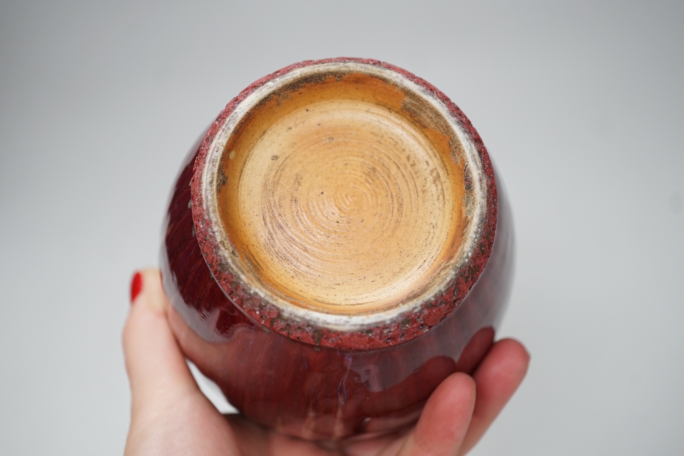 A Chinese Sang De Boeuf vase, 15cm